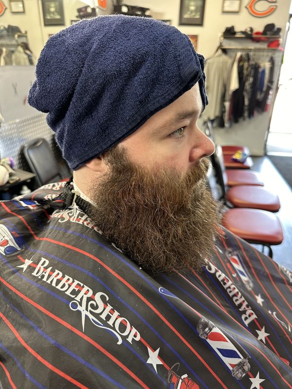 Hot Towel Head Shave at 20 & Out Barbershop
